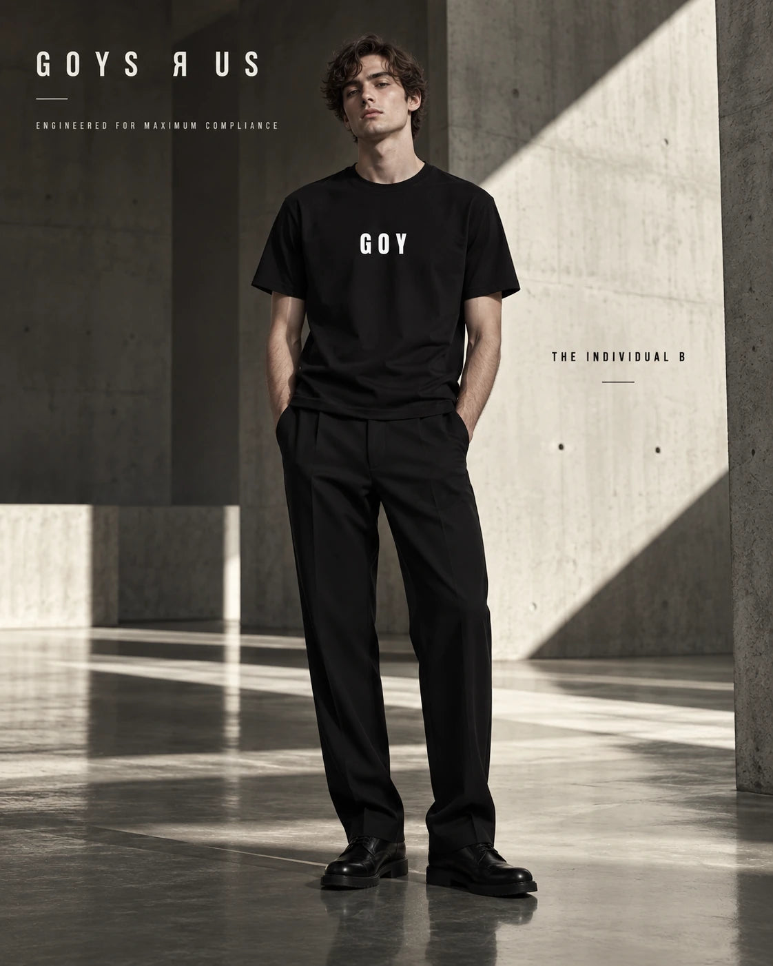 The Individual B — black basic-fit unisex T-shirt, styled on a male campaign model. Campaign visualisation, not a fit guide.