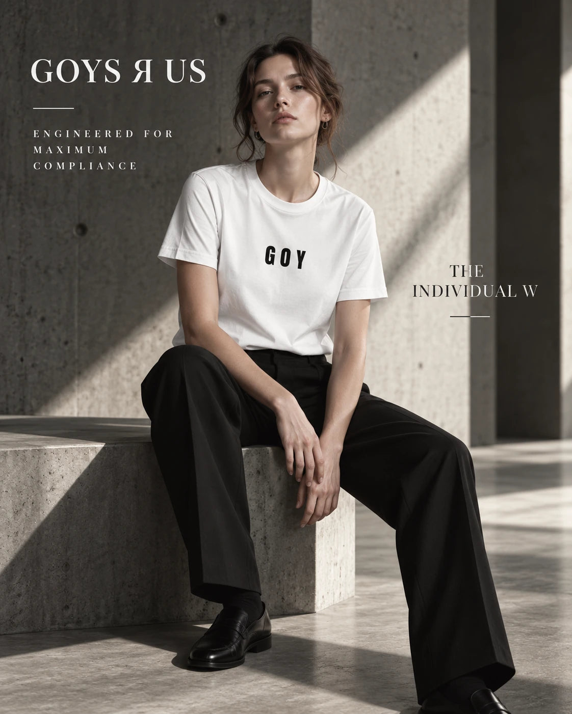 The Individual W — white basic-fit unisex T-shirt, styled on the seated female campaign model. Campaign visualisation, not a fit guide.